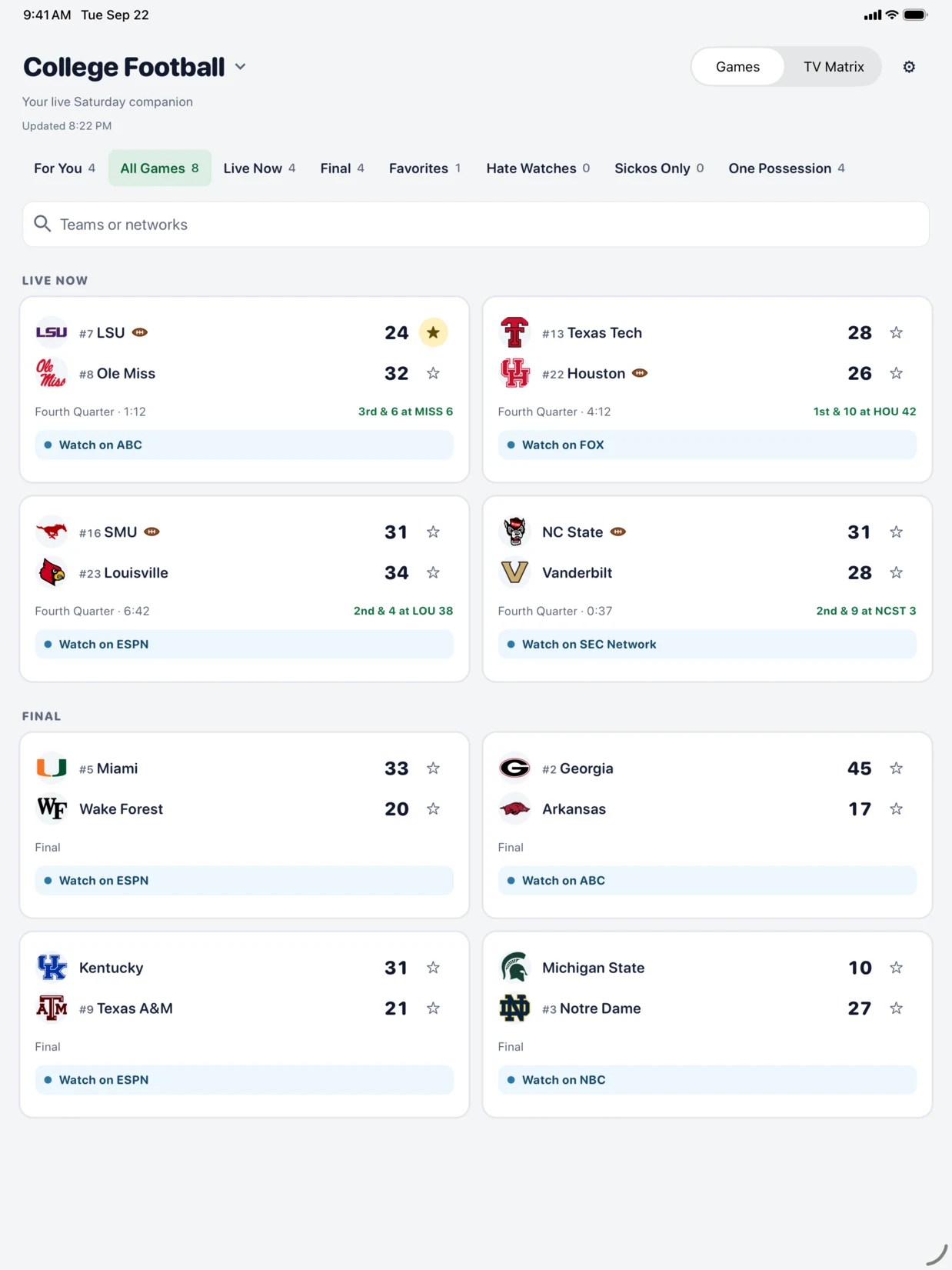 The live college football slate on iPad, with multiple games, scores, and broadcast links